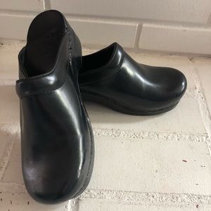 Dansko clogs, never worn.